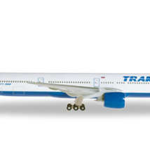 Herpa527507 Модель самолета Boeing 777-300 Transaero Registration: "El-UNM" 1/500